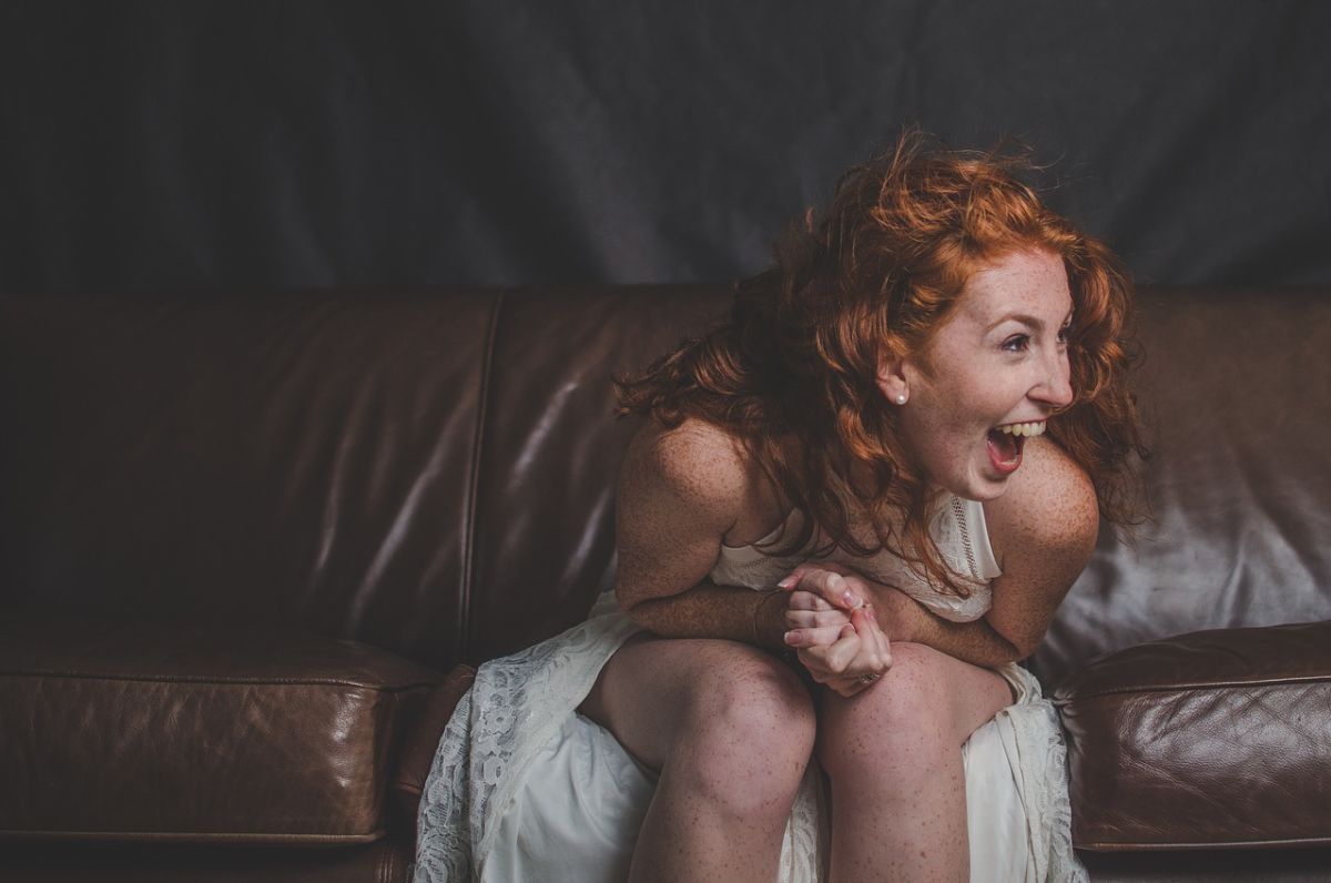 Laughing woman with red hair