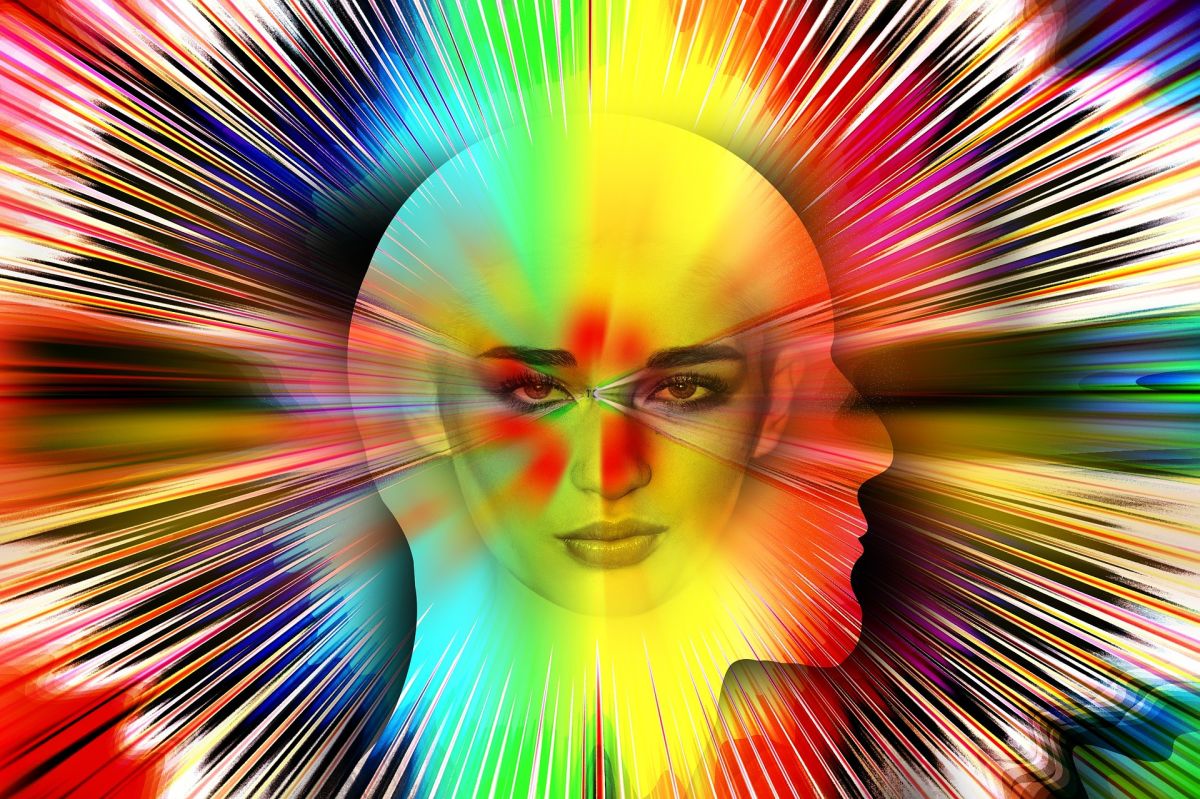 Human psyche: Man, woman, psychedelic brain colors