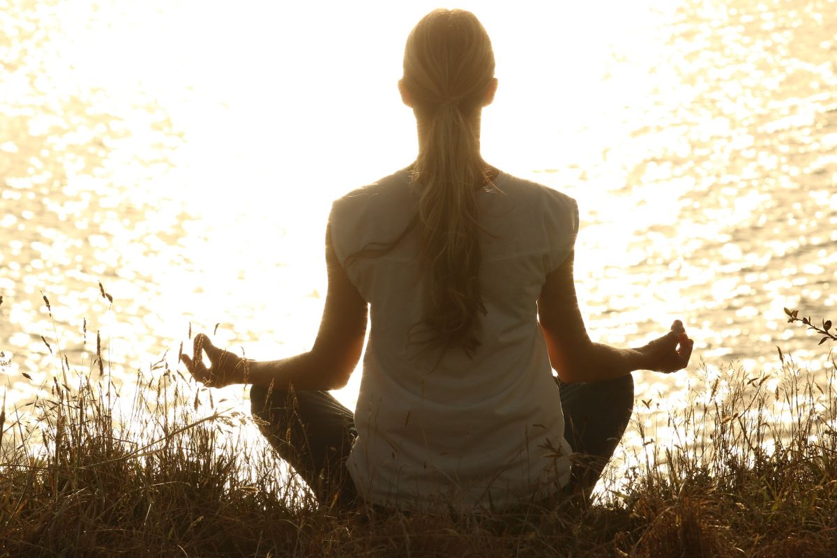 Meditating woman, light, radiation, sun, silhouette, meditation