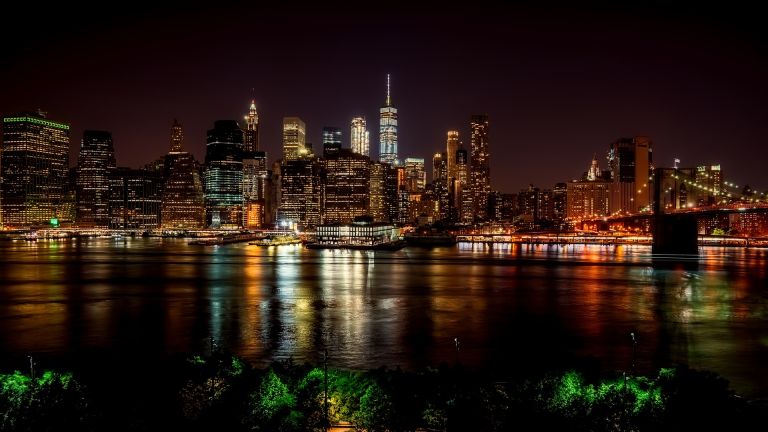 New York City: Skyline with reflection in Hudson river