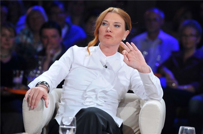 Tatjana Strobel, sitting in a tv show