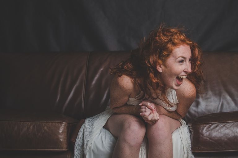 Laughing woman with red hair