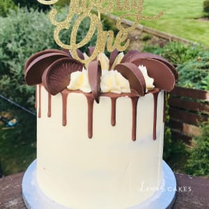 Celebration cake: A gold glitter topper and chocolate covered ears