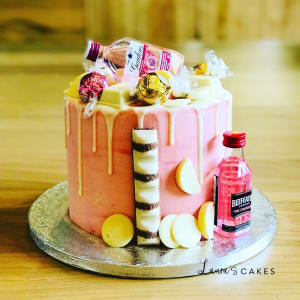 Celebration cake: A bottle of soda and a bottle of soda