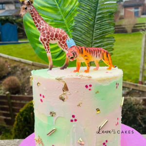 Celebration cake: A gi and a gi on top