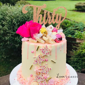 Celebration cake: A pink and gold topper