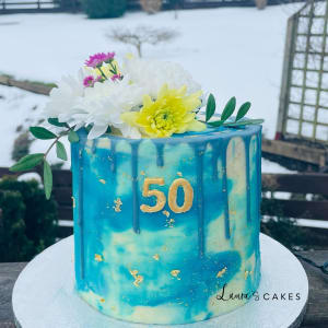 Celebration cake: A number 50 on it