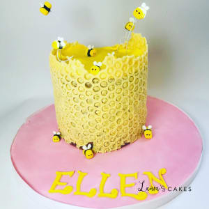 Celebration cake: A bee theme on it