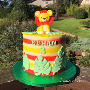 Celebration cake: A lion on top