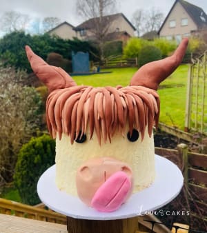 Celebration cake: A cow head on top