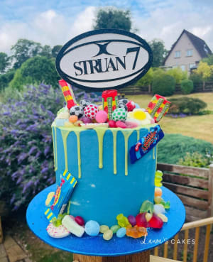 Celebration cake: A blue frosting drip drip drip drip drip drip drip drip drip drip drip drip drip drip