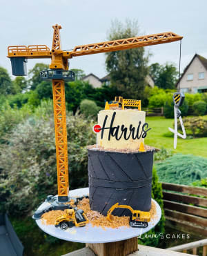 Celebration cake: A construction cake with a crane on top