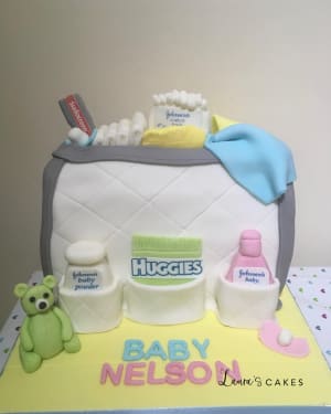 Celebration cake: A baby ' s diaper and a teddy bear