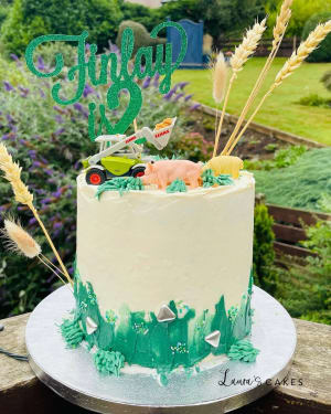 Celebration cake: A green frosting and a green topper