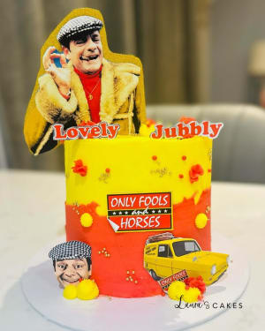 Celebration cake: A man on top and a car