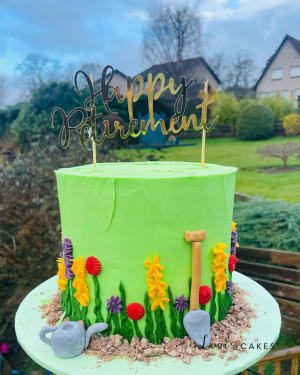 Celebration cake: A green cake with a garden theme and a garden theme