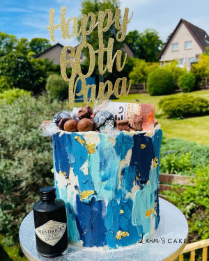 Celebration cake: A blue and gold paint drip drip drip drip drip drip drip drip drip drip drip drip drip