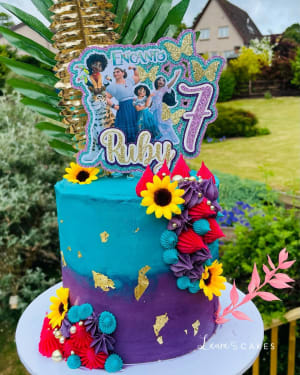 Celebration cake: A picture of a girl on top