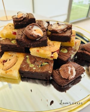 Wedding cake: A plate of brownies with chocolate and nuts