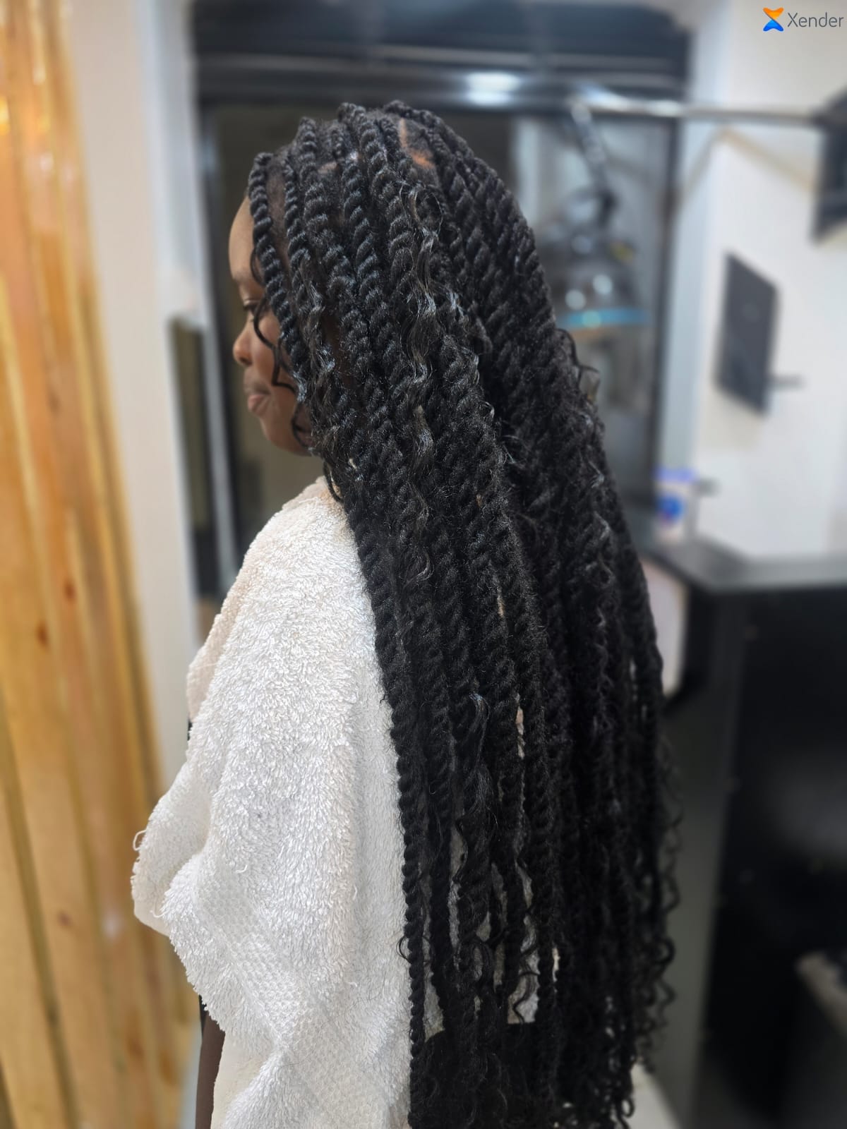 Braided hair style at a natural hair salon in Eldoret