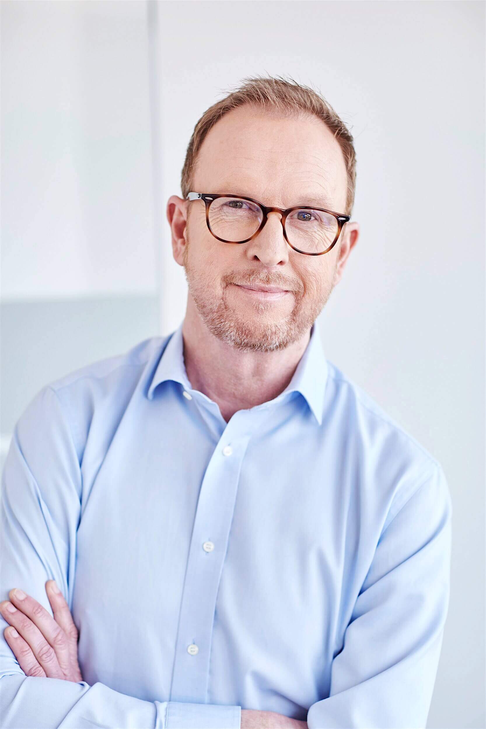 Rasmus Schübel Fotograf Münster Colosseum Dental Branding professionelles Portrait Zahnarzt Praxis Team herzlich