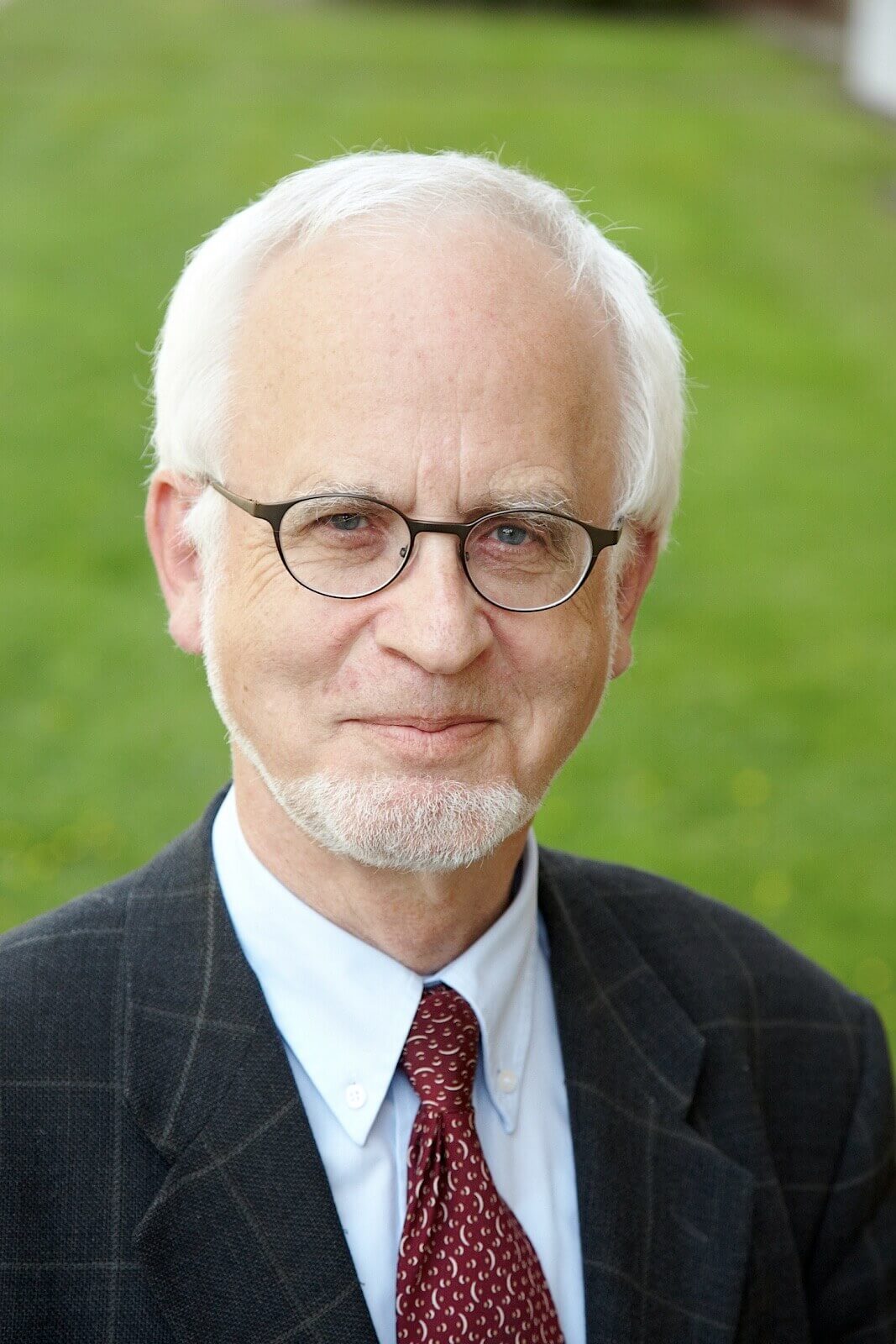 Rasmus Schübel Fotograf Münster icbf WWU Universität Hochbegabtenförderung Marke Website professionelles Portrait Wissenschaftler offen