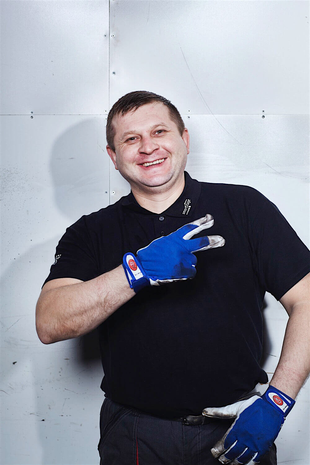 Rasmus Schübel Fotograf Münster Kultour mobile Bühnen Marke Foto authentisches Business Portrait Team entspannt