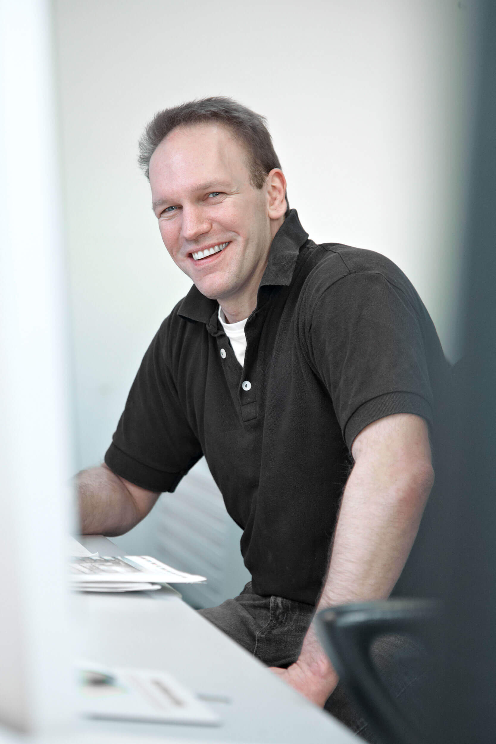 Rasmus Schübel Fotograf Münster Druckhaus Stegemöller Video Foto authentisches Business Portrait Team Druckerei herzlich