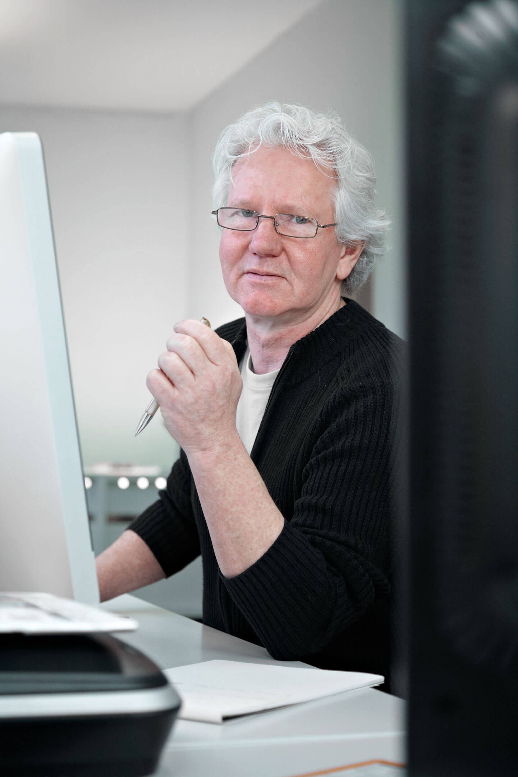 Rasmus Schübel Fotograf Münster Druckhaus Stegemöller Foto Video Marke authentisches Portrait Team Druckerei kompetent
