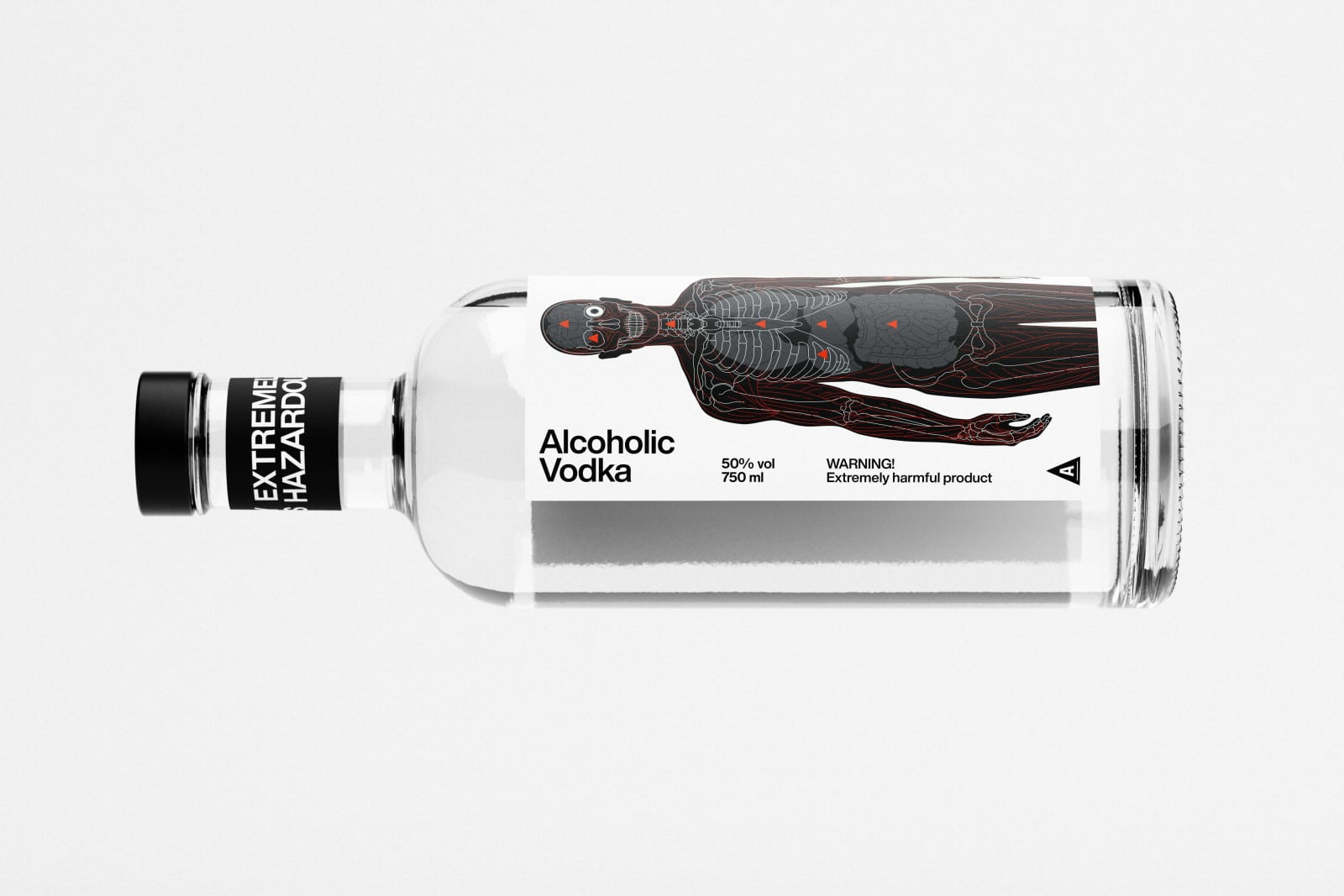Alcoholic Vodka clear glass bottle on its side, white label with body diagram illustration and black 'Extremely Hazardous' neck band