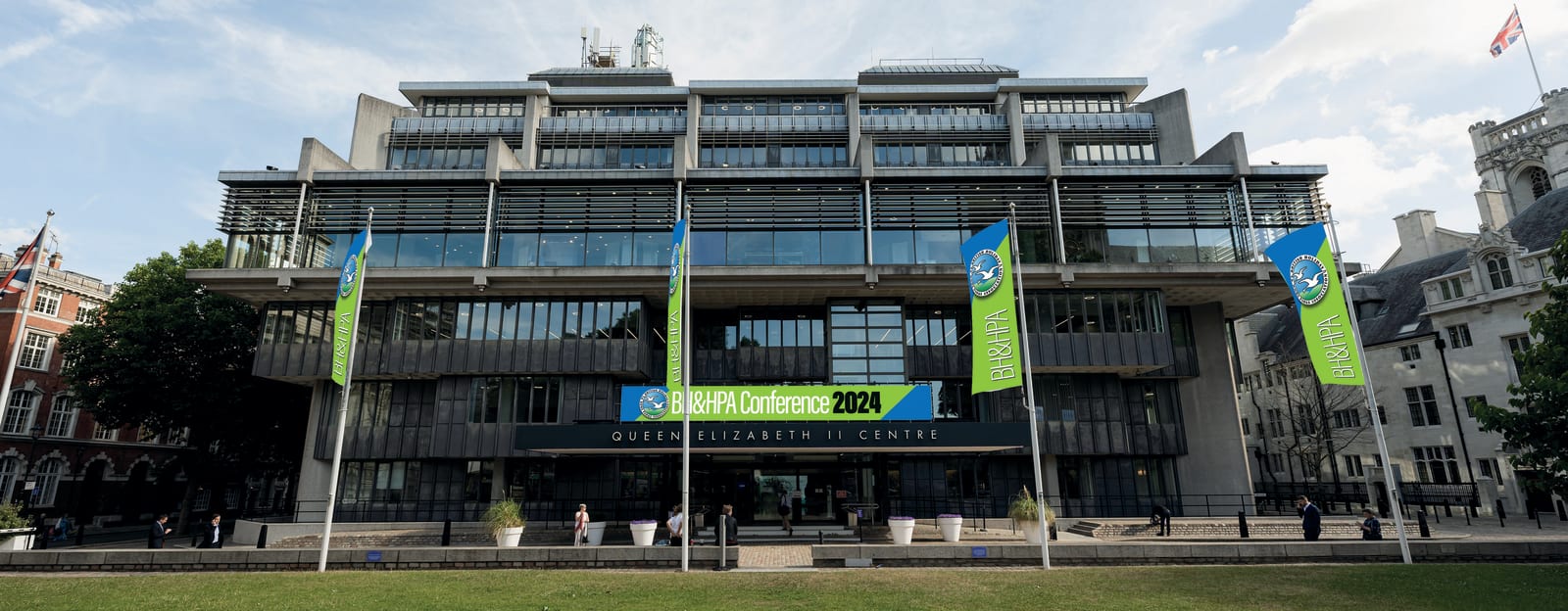 Outside the QE II Centre, showing BH&HPA banners