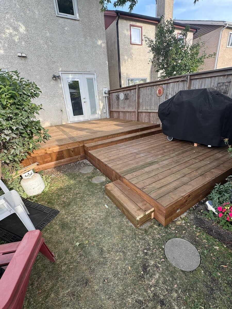 Two-level backyard deck with step-down platform