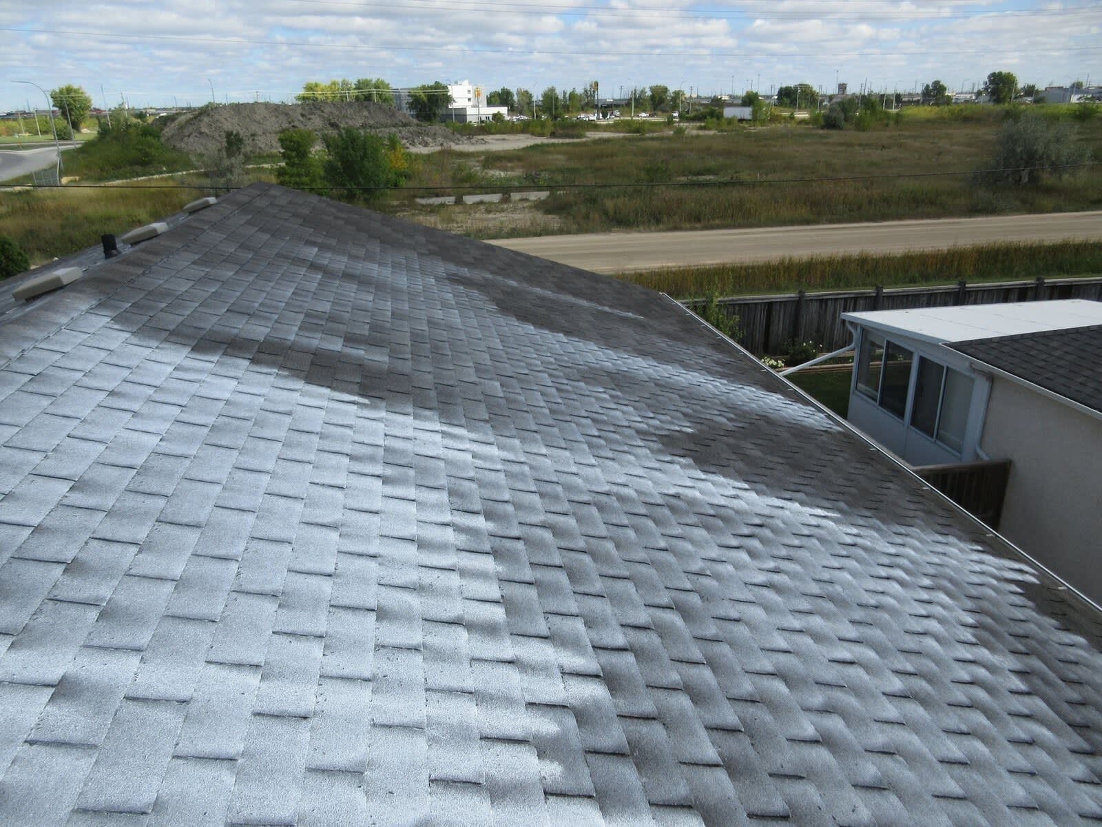Treated asphalt roof on a Winnipeg home