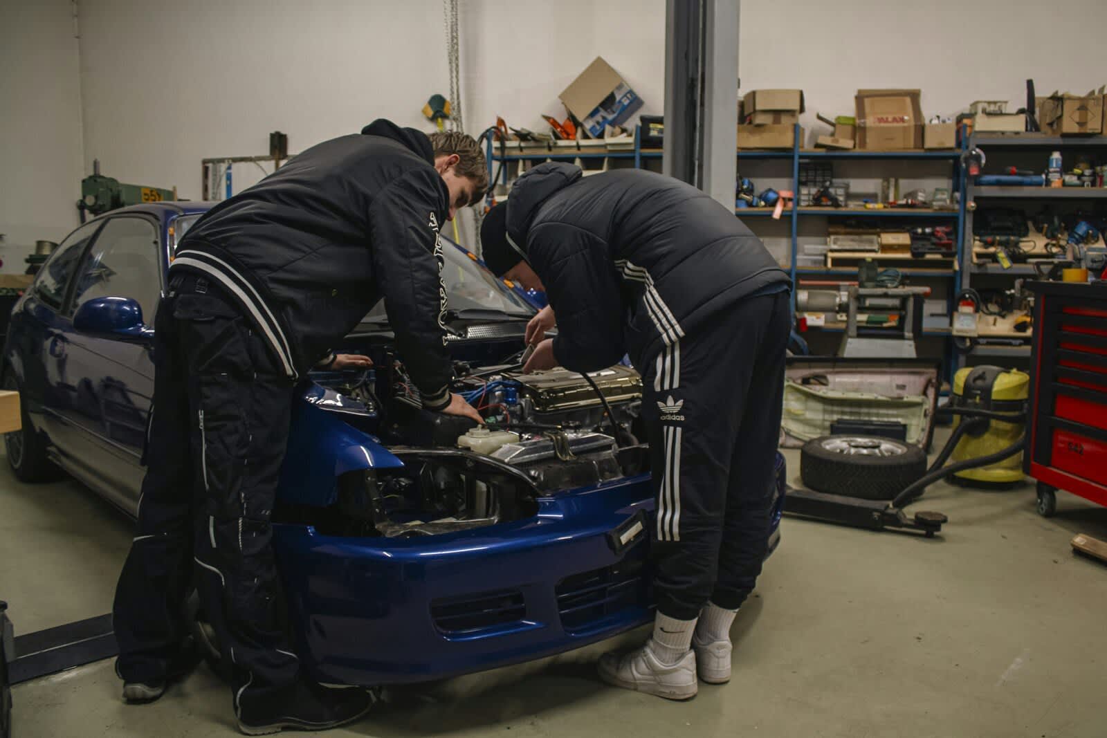 PureGloss Detailing team working on a vehicle