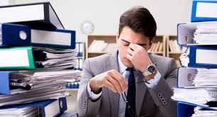A person in a suit with his eyes closed

AI-generated content may be incorrect.