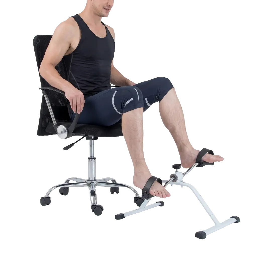 Person using the mini pedal exerciser under a desk with an office chair