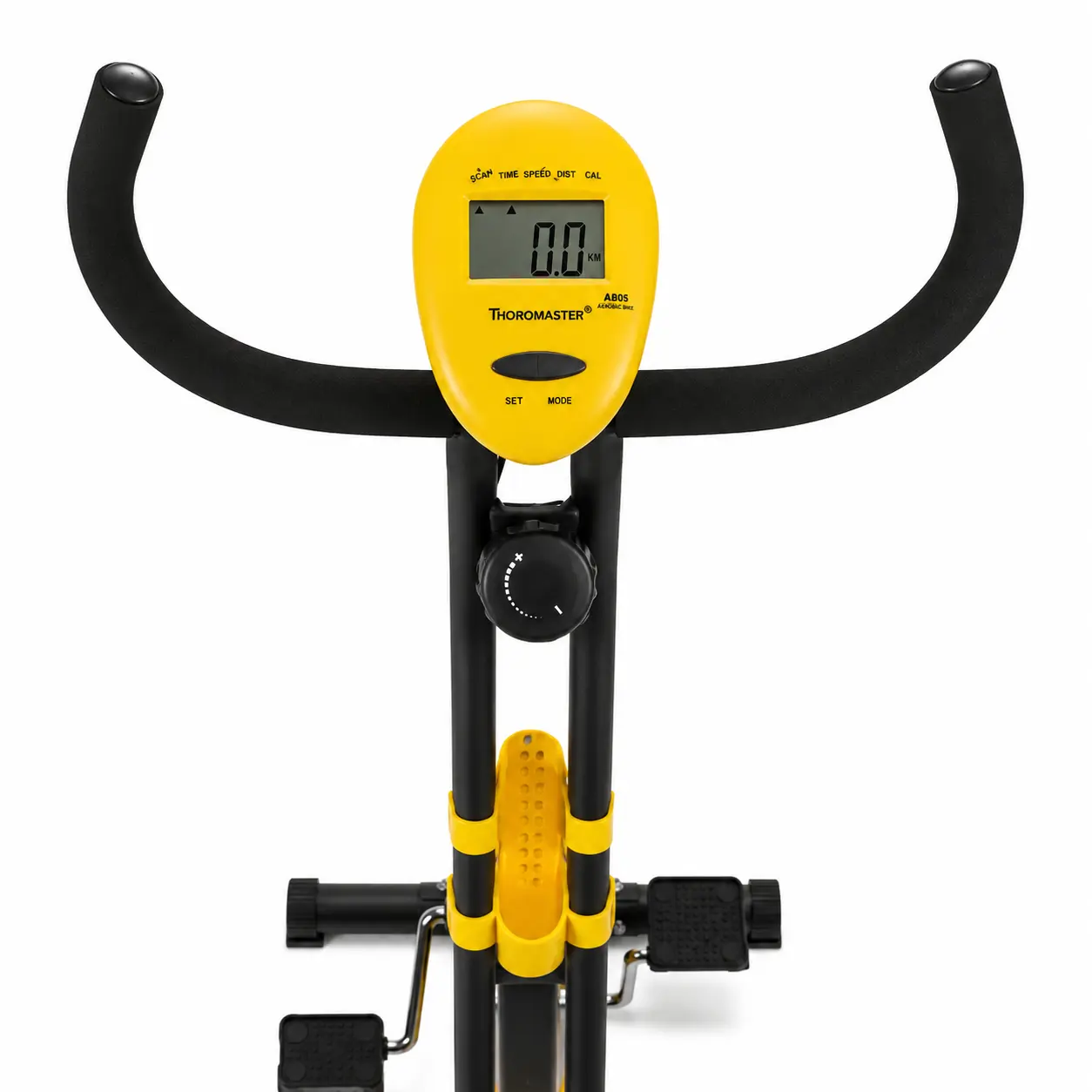 Close-up of the yellow digital workout console showing scan, time, distance and calories with reset and mode buttons