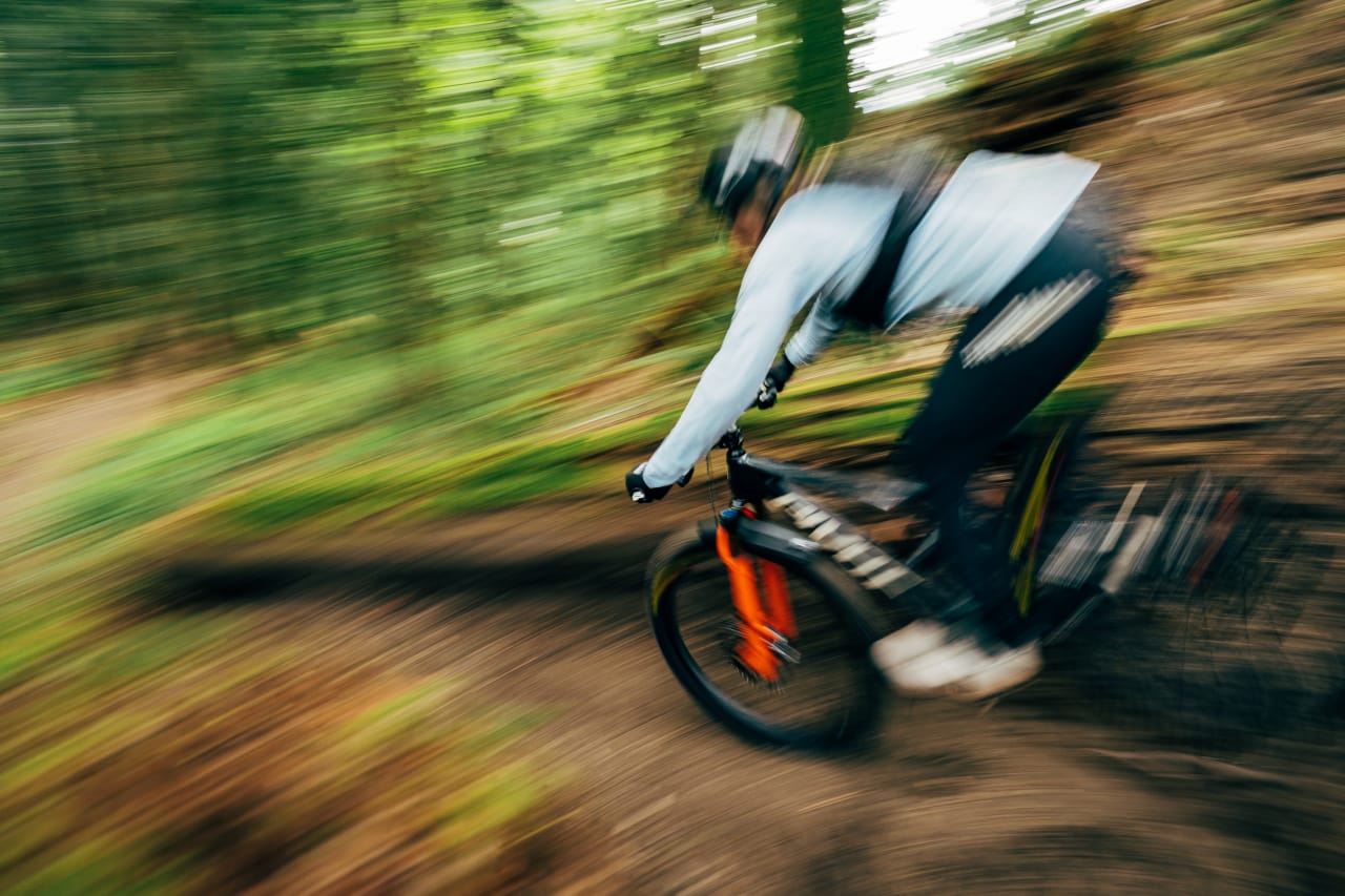 Jill Kintner going really fast on a fast Pivot bike