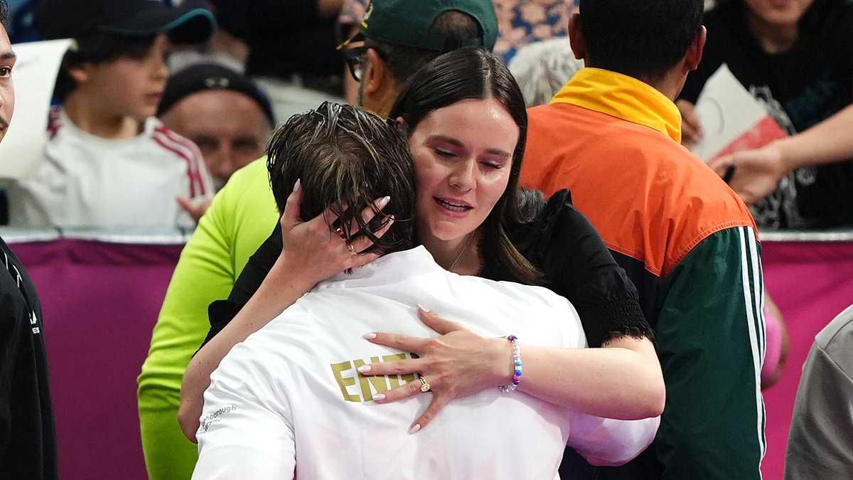Holly Ramsay supports Adam Peaty after he wins bronze in the Commonwealth Games 50m breaststroke final