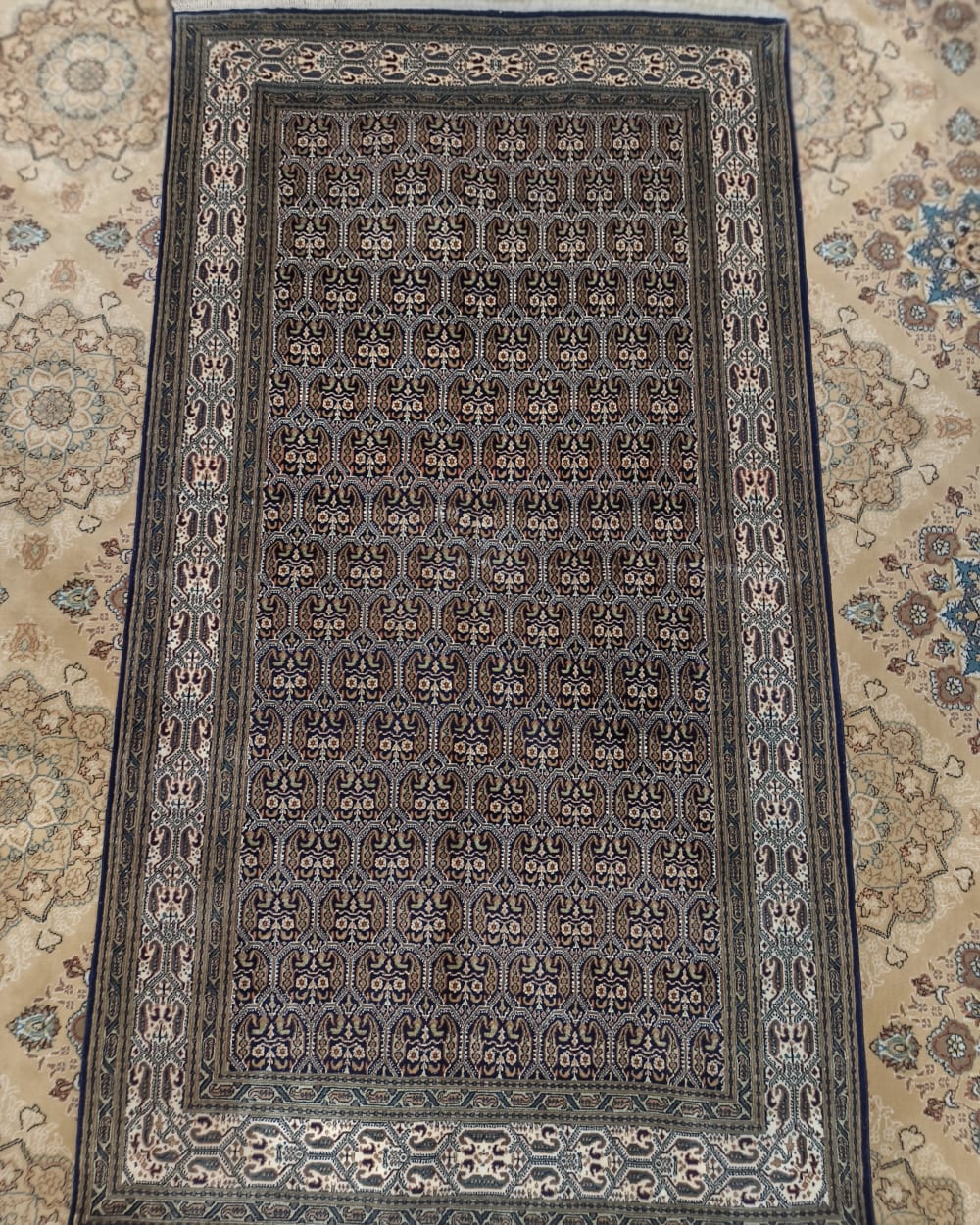 Detailed handmade Kashmiri carpet