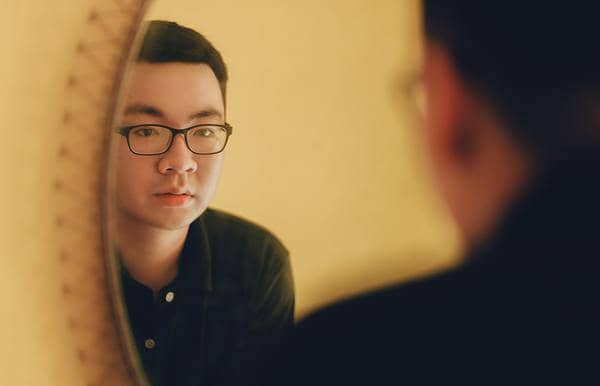 A person looking in the mirror