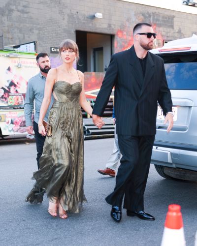 Taylor Swift Wears Travis Kelce’s Blazer Over Bronze Cutout Gown in NYC