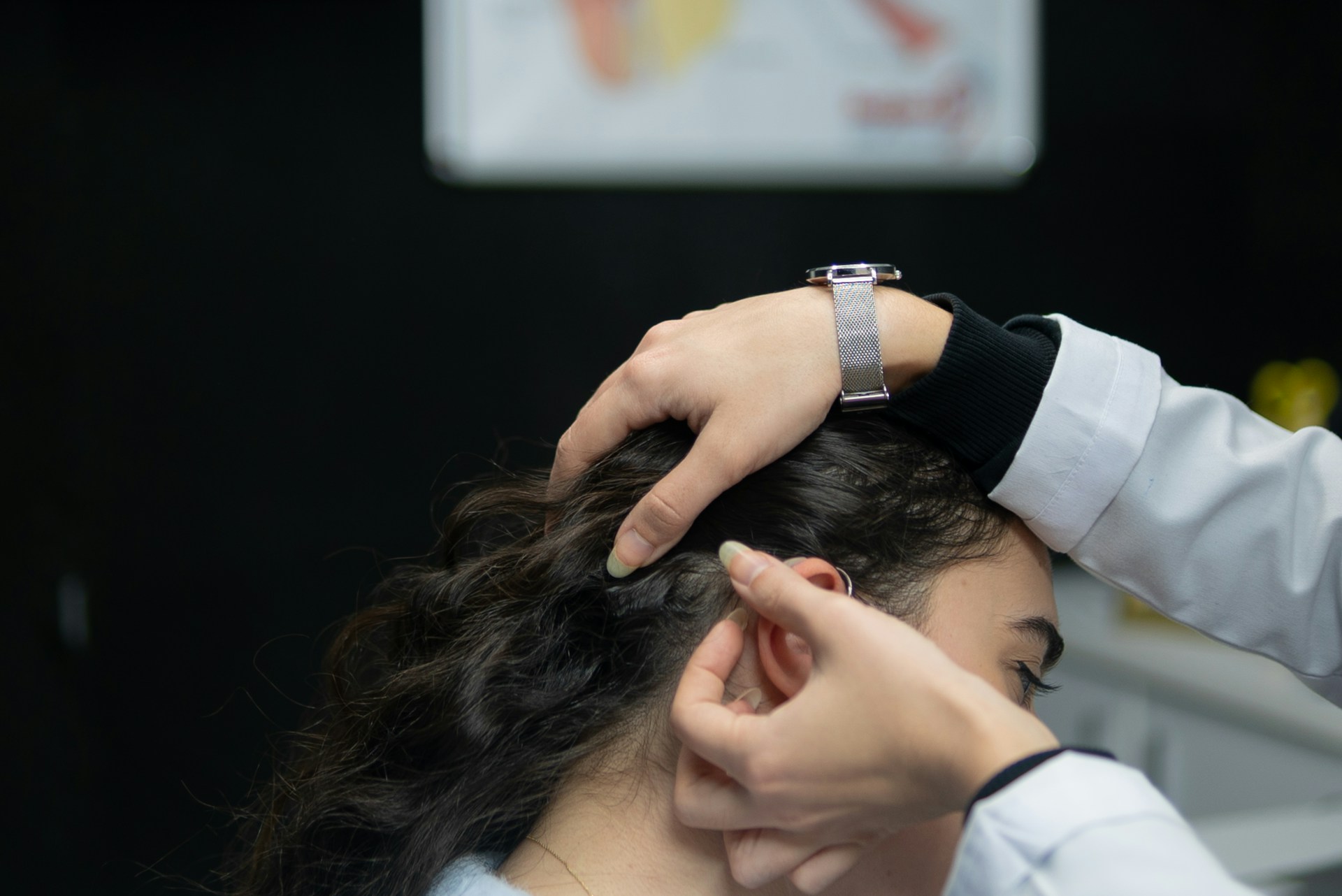 doctor examining a patient with tinnitus