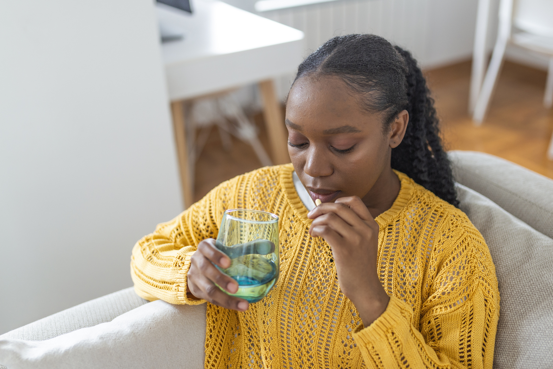 woman taking medication