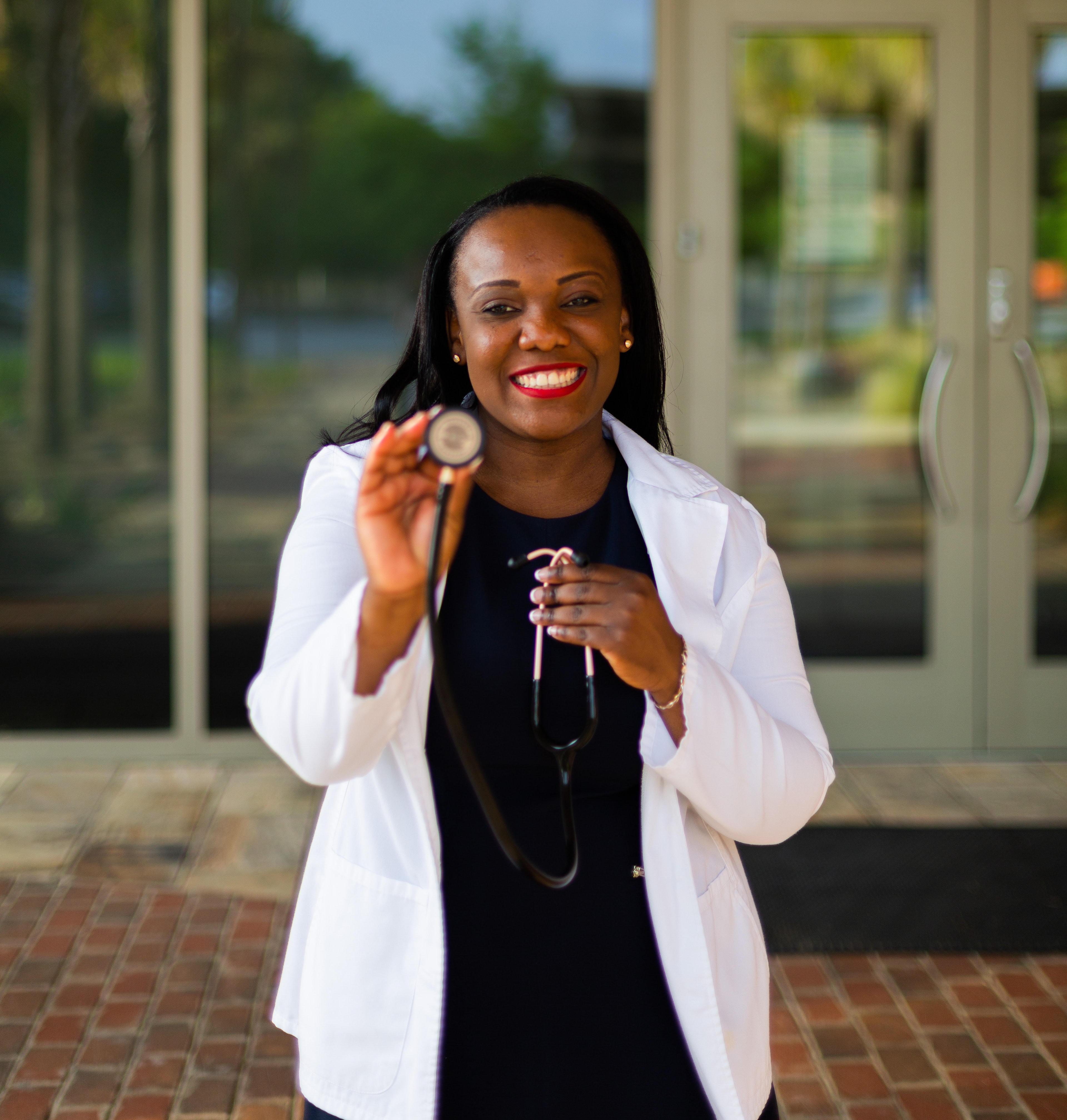 fertility doctor holding a stethoscope