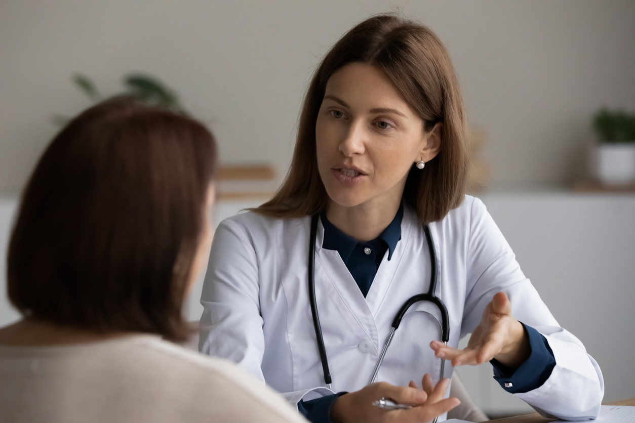 doctor consulting with patient about heart attack risk