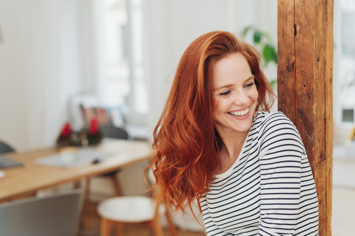 smiling redhead woman