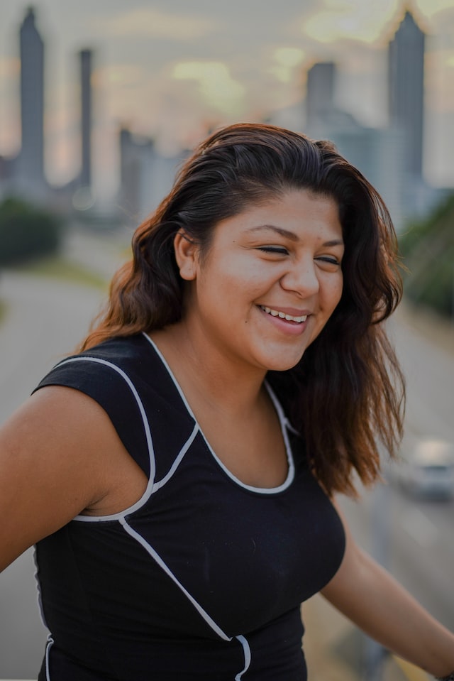 woman smiling outdoors