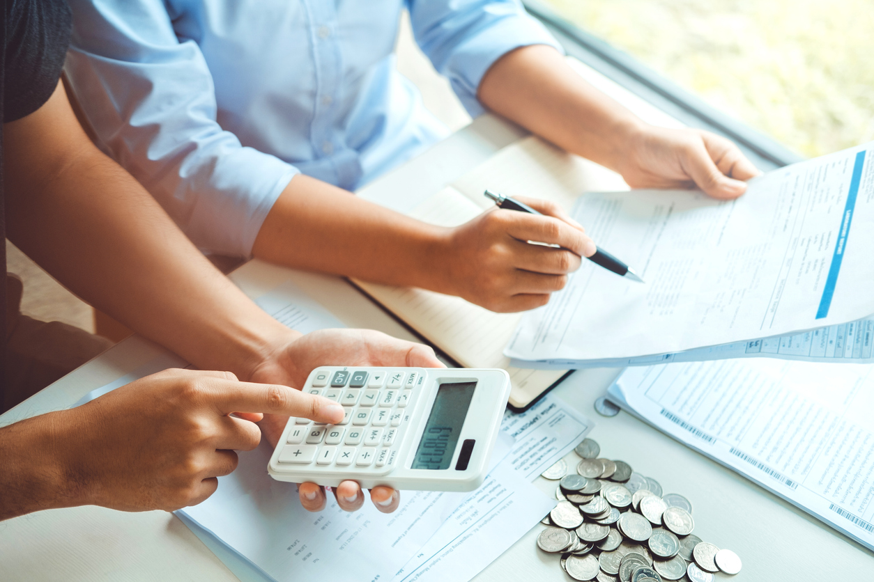 couple calculating finances