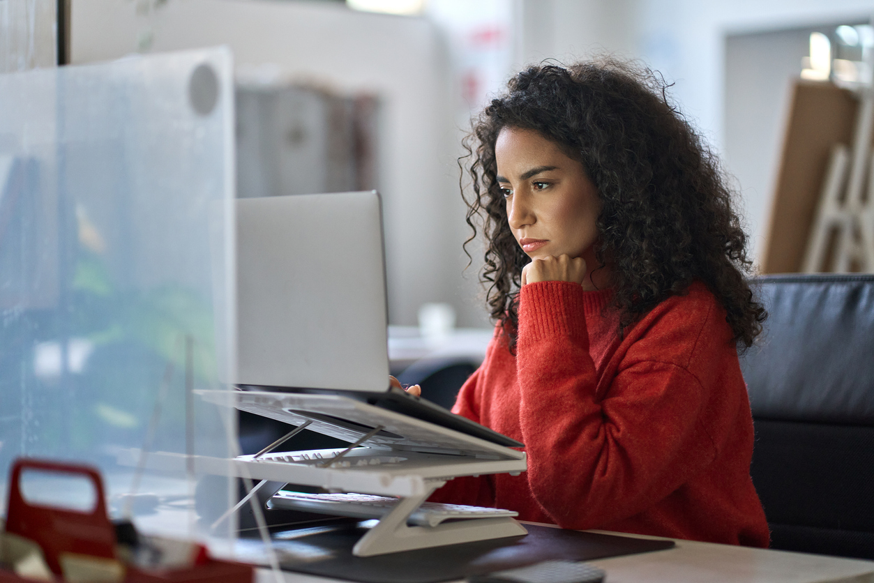 woman researching a fertility clinic's success rates